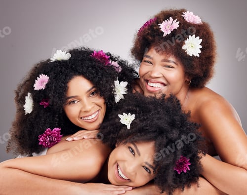 Preview: Friends, hair care and portrait of black women with flowers in studio isolated on a gray background