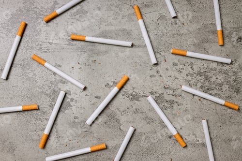 Cigarettes on a Gray Textured Background