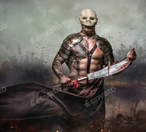 Preview: Male in the skull mask holds sword in the dust batterfield background.