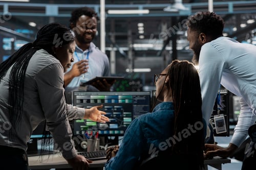 Preview: Coworkers programming in server farm housing advanced infrastructure