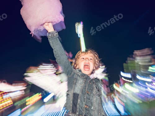 Preview: Excited boy with cotton candy