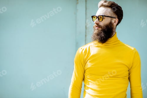 Preview: Portrait of a stylish man on the colorful background