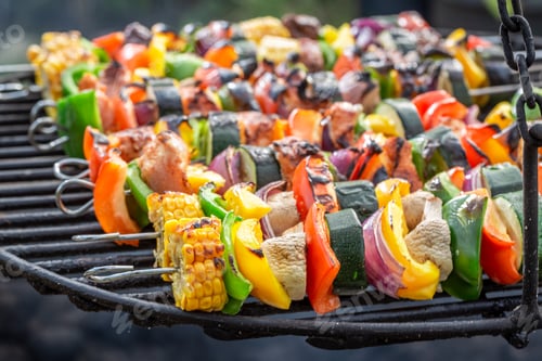 Preview: Hot skewers on grill with meat and vegetables