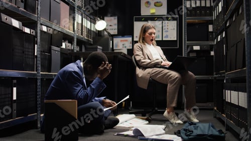 Preview: Tired inspectors analyzing evidence