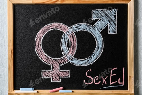 Preview: Gender symbols and text "SEX ED" written on small blackboard