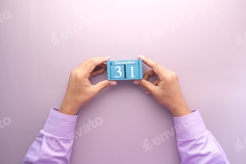 Preview: wooden calendar set on 31December on purple background