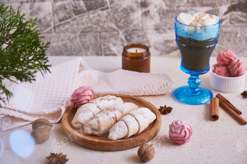 Preview: Aesthetic handmade Christmas crescent bagels and marshmallow, star anise, Viennese coffee. Cozy home