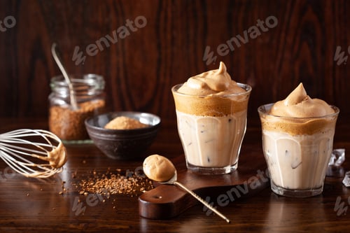 Preview: dalgona coffee in glass. trendy Instant coffee whipped with sugar and hot water