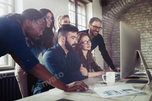 Preview: Company employees working in office