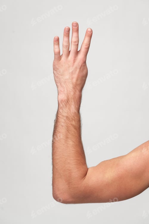 Preview: Mans Hand Showing Sign against gray background