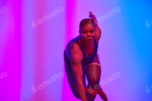 Preview: Body positive, slimming. African american woman in sportswear workout, fashion studio shot