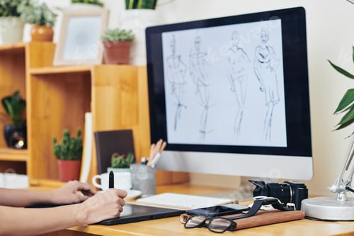 Preview: Graphic designer drawing fashion illustration