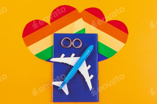 Preview: Gay Marriage Concept with Rainbow flag and rings