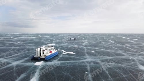 Preview: Aerial view of the machine moving on the frozen amazing lake. Clip. Typical hovercraft vehicle on