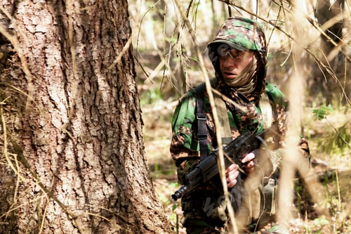 Preview: Ukrainian soldiers man dressed military camouflage uniform with weapon in woodland