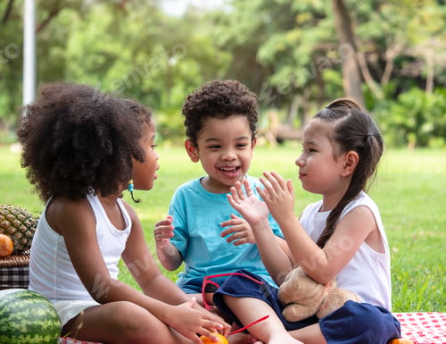 Preview: Group of little friends various ethnic playing in park