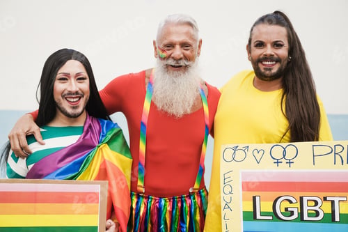 Preview: Gay people having fun at pride parade with LGBT banner outdoors - Focus on left drag queen face