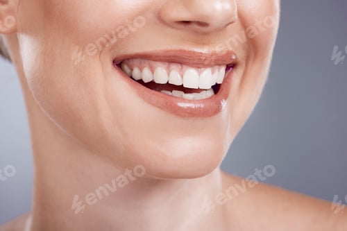 Preview: Smile, mouth and teeth whitening of woman in studio, background and wellness. Closeup female model,
