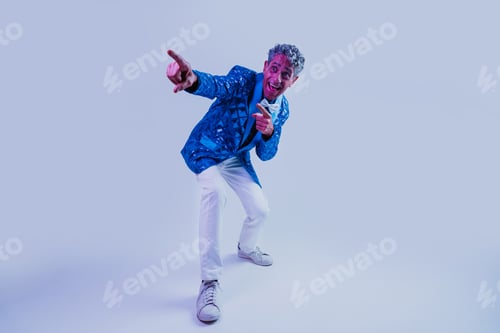 Preview: Senior man posing in studio.