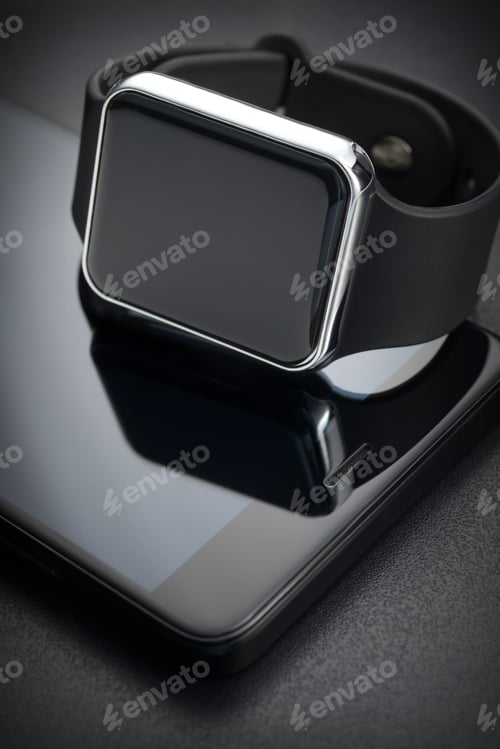 Preview: Black smart wrist watches and smartphone