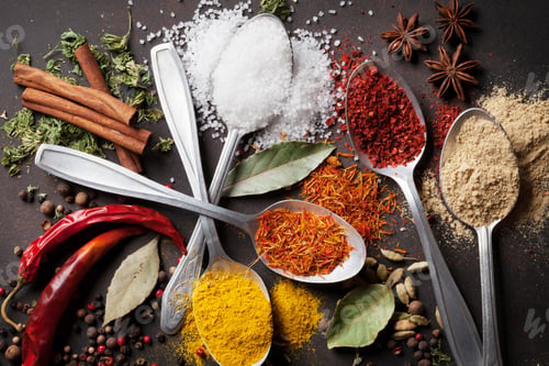Preview: Various spices spoons on stone table