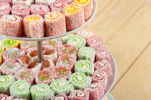 Preview: Turkish delight on a wooden table.
