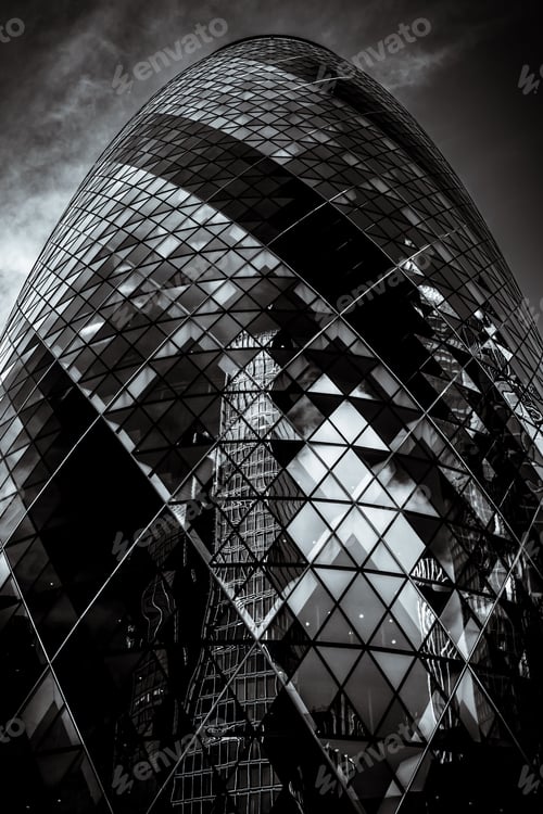 Preview: Monochrome architectural shot of the Gherkin in London with dramatic reflections