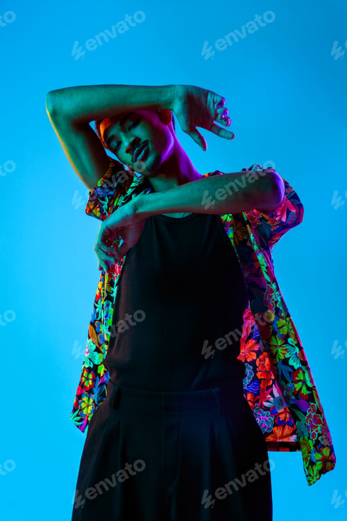 Preview: African man portrait in studio on colorful background