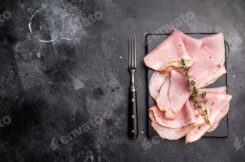 Preview: Thinly Sliced Pork Ham Prosciutto Cotto. black background. top view