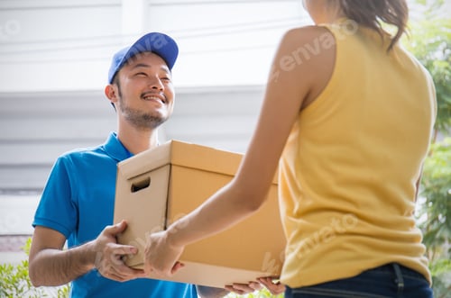 Preview: Woman accepting a delivery of boxes