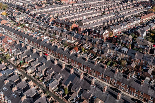 Preview: Aerial view of rows of back to back terraced house in a UK city