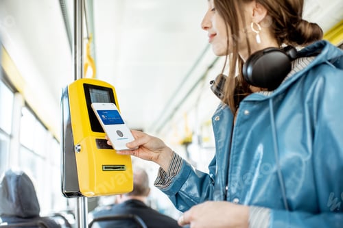 Preview: Woman paying with phone for the public tarnsport
