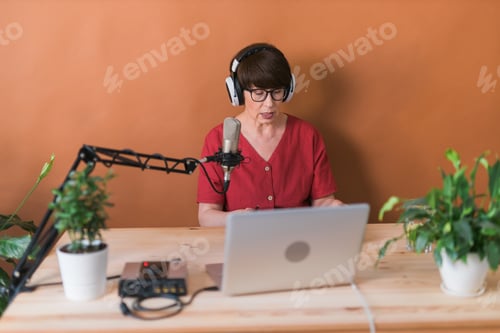 Preview: Middle-aged woman radio host making podcast recording for online show - broadcast and dj concept