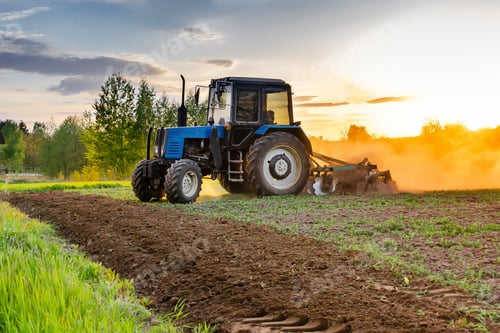 Preview: blue tractor machinery plowing agricultural field cultivating,soil tillage seeding plants,crops