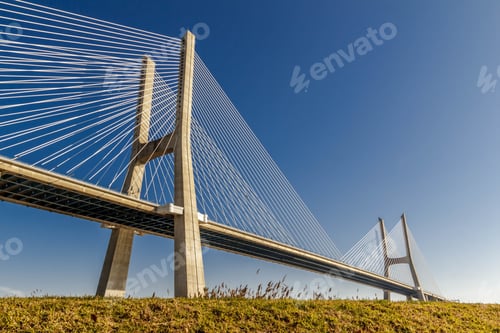 Preview: Big cement bridge on a field under the clear blue sky