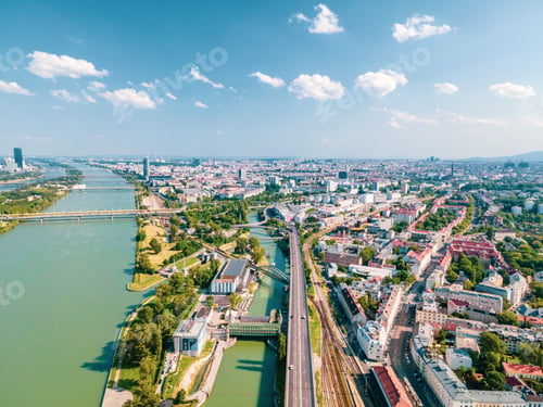 Preview: Aerial drone view of Danube river in Vienna Austria cityscape with danube island