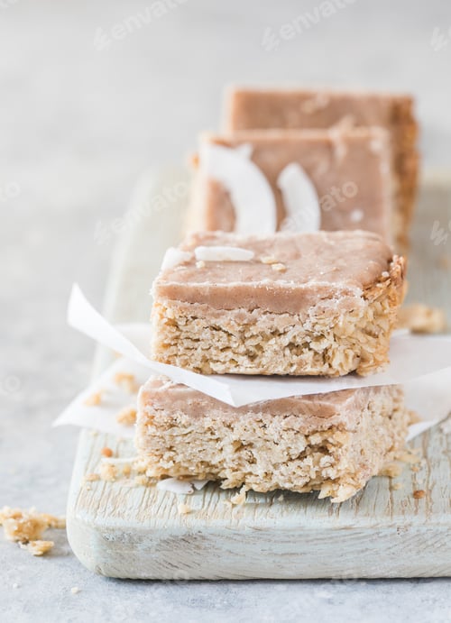 Preview: Healthy protein granola flapjack snack bars. fitness and sports people, fitness bar, diet concept