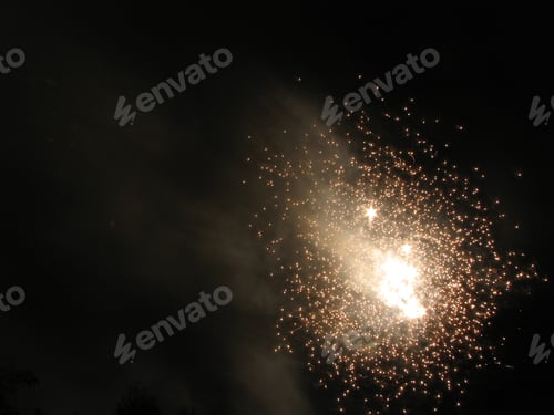 Preview: Closeup shot of beautiful fireworks in the sky during the night