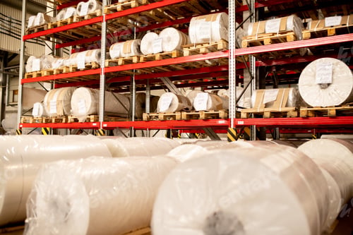 Preview: Rows of rolled and packed newly produced huge bobbins of polyethylene membrane