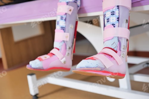 Preview: Child cerebral palsy disability, legs orthosis.