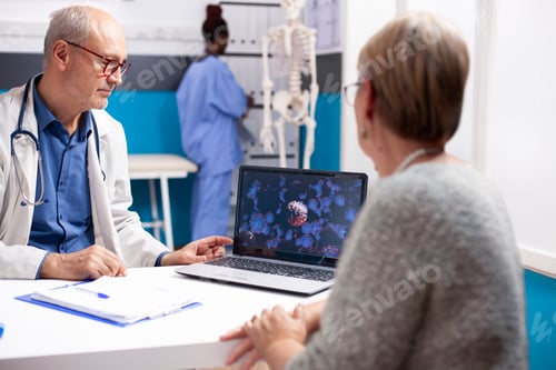 Preview: Doctor shows virus image to senior woman