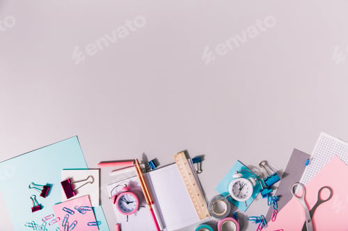 Preview: Pink and blue stationery creatively depicted on white background. Back to school concept.