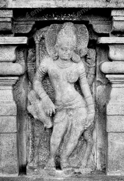 Preview: Closeup shot of a religious sculpture featuring intricate details and designs adorning a wall