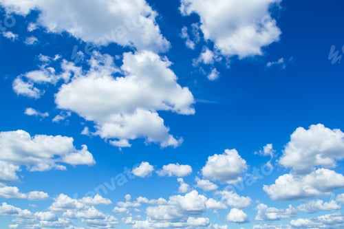Preview: Beautiful summer blue sky. Fluffy white cumulus clouds.
