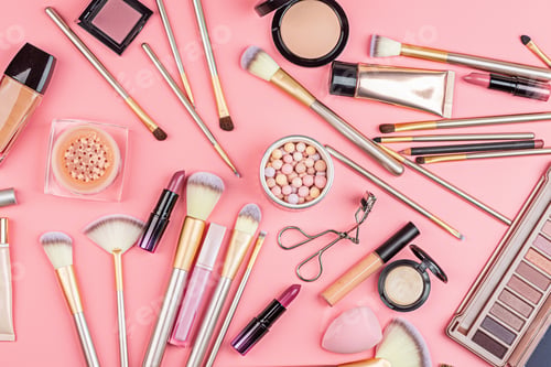 Preview: Flat lay of luxury decorative cosmetic products on pink background