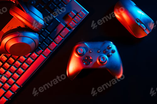 Preview: Computer keyboard, mouse and joystick on black background