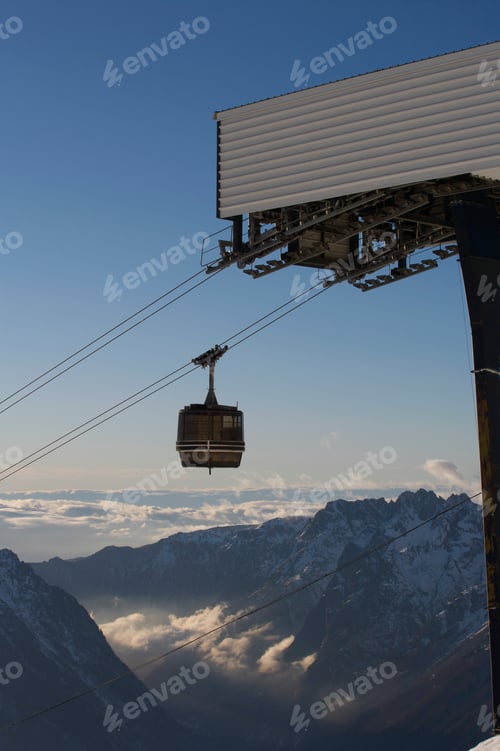 Preview: View of Ski gondola and valley.