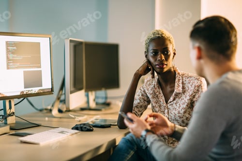 Preview: Software engineers working on project and programming in company