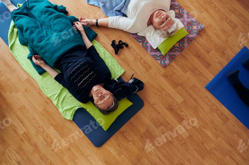 Preview: Top view of group of senior women engage in various yoga exercises, including neck, back, and leg