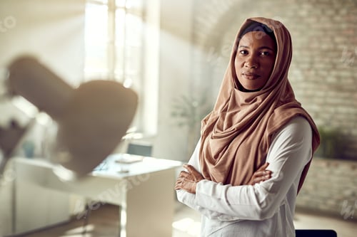 Preview: Portrait of confident Muslim businesswoman in the office.